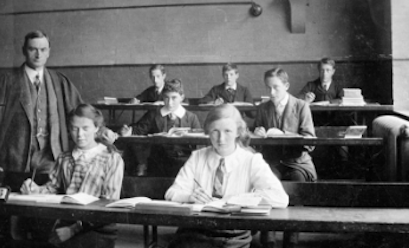 Headmaster R.E. Yates with pupils, c.1920